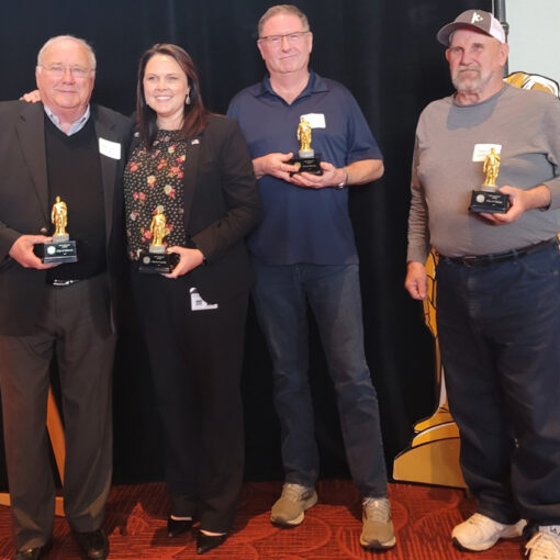 Detroit Mayor Jim Trett, Marion County Commissioner Danielle Bethell, Mill City Mayor Tim Kirsch and Ron Carmickle, mayor of Gates, are shown at the Travel Salem awards event that honored the Santiam Canyon for its resilience.
